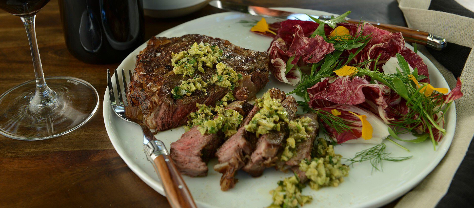 Grilled Ribeye with Green Olive Tapenade